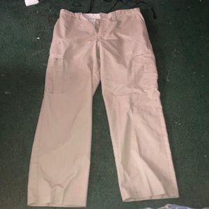 These cargo pants from Dickies are high waisted tan, large bottom pants.